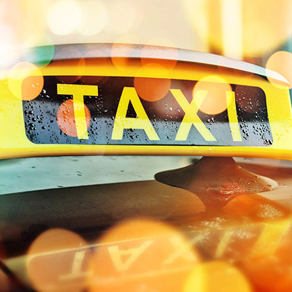Taxi sign on a cab