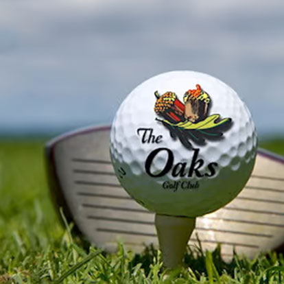 The Oaks logo on a golf ball